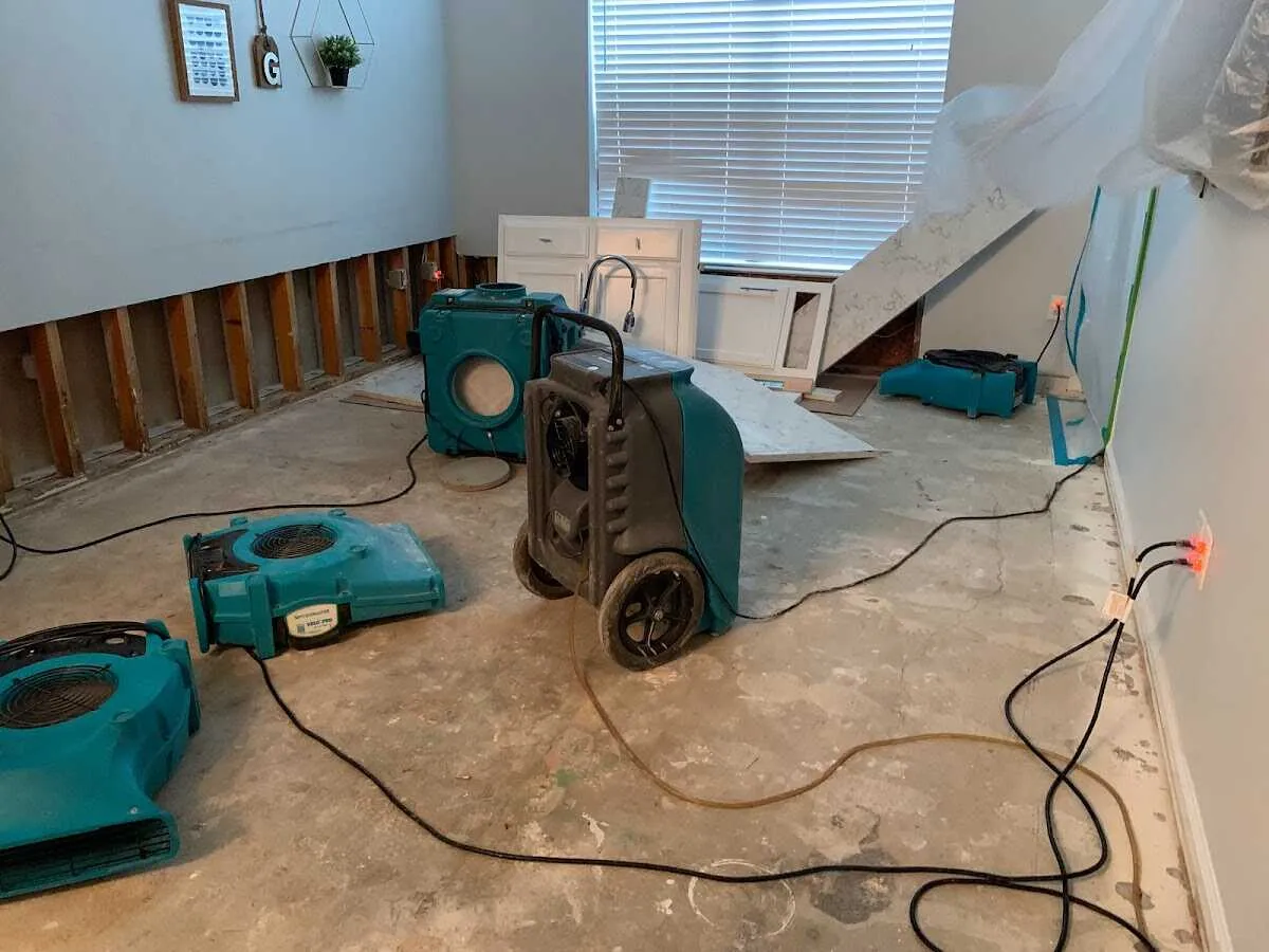 Dehumidifier in flood-cut room for Water Damage Restoration in Oak View